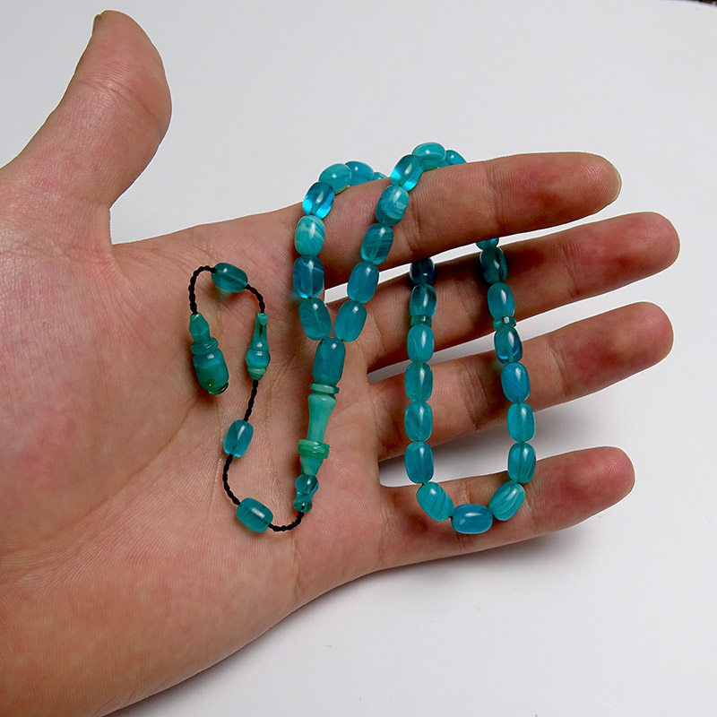 Turkuaz Renk Hareli Kapsul Kesim Kehribar Tesbih 